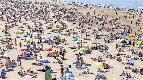 milf op het strand|Nederlandse voyeur strandseks milf